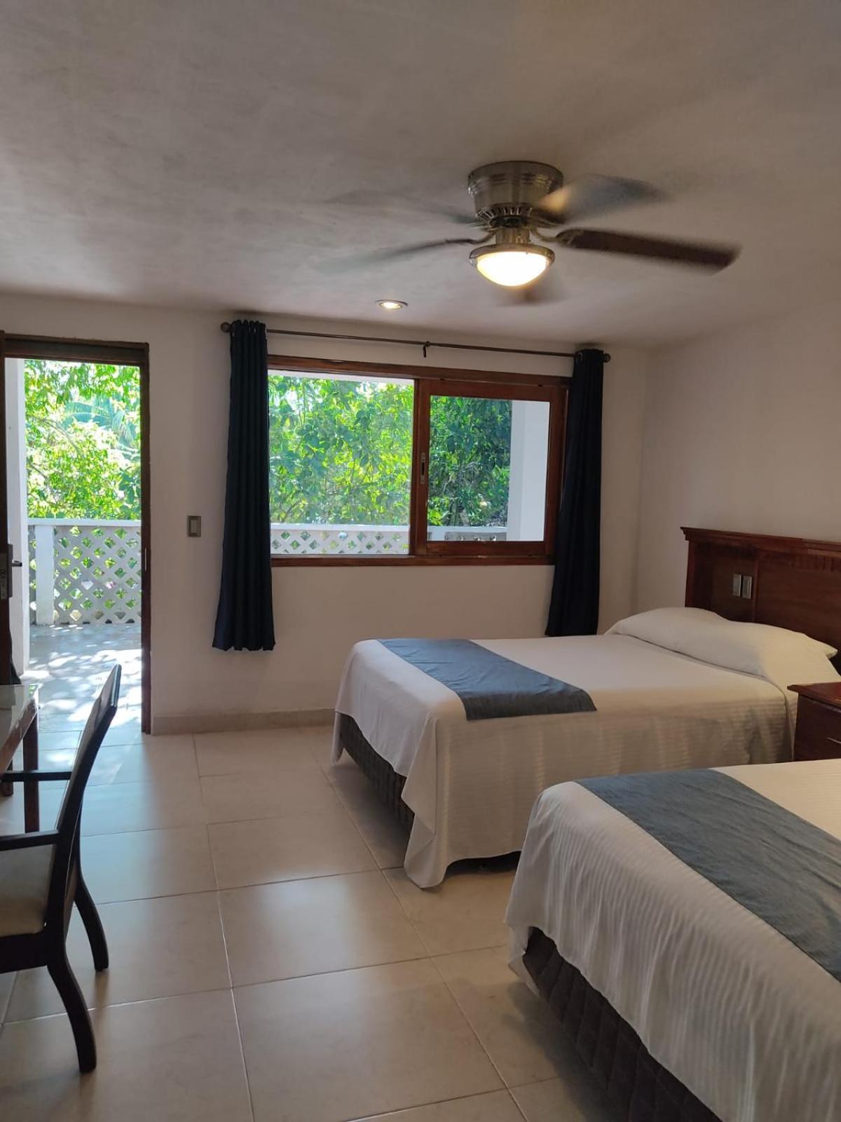 Hotel Puerta Chichen Bagian luar foto